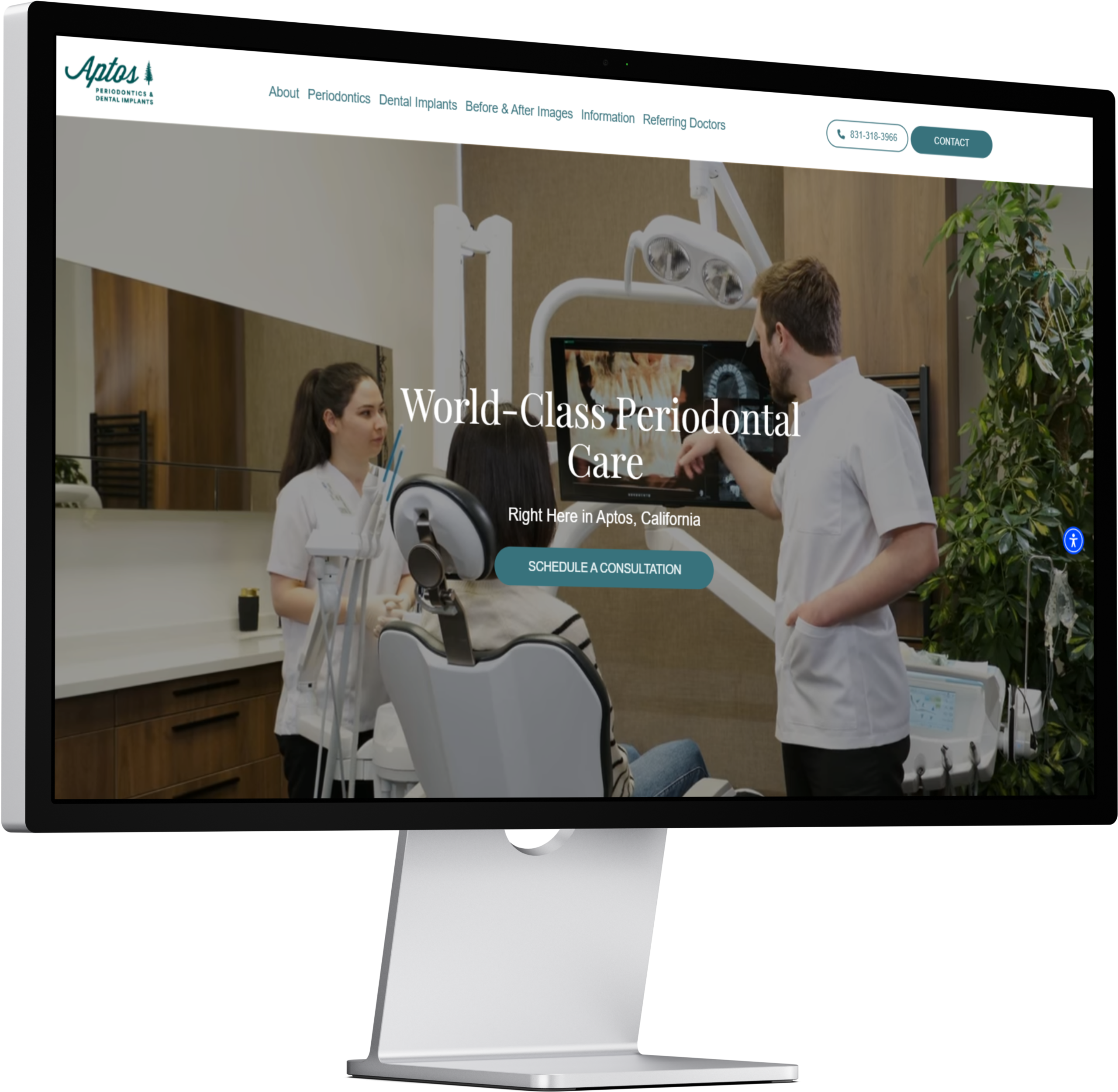 Desktop monitor displaying a professional periodontal practice website with clinicians and dental equipment.